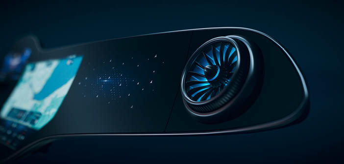 Analogue air vents are integrated into the digital surface