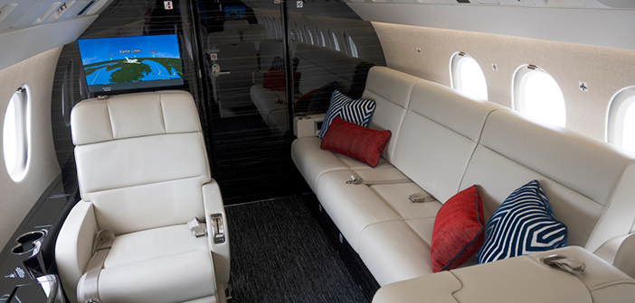 The overall design of this Falcon 900EX EASy, recently refurbished by Duncan Aviation, is clean and masculine with a lot of leather and dark, heavily grained veneer, mixed with textures to help soften the overall space