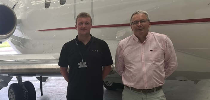Dan Rogers, CEO of Jets (left), and Tim Barber with Duncan Aviation Aircraft Sales (right), recently signed an agreement for Duncan Aviation to identify and acquire six project aircraft