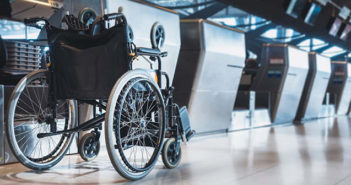 Aircraft Interiors Expo releases Diversity in Aviation report A wheelchair parked at an airport check-in desk