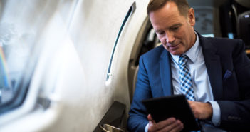 New Jet ConneX service plans to be supported by SD Plane Simple Ka-band terminal A passenger using a tablet in a business jet