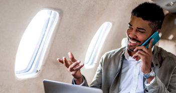 Inmarsat SwiftJet now available with Raytheon Technologies A passenger making a voice call in a business jet