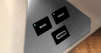 A unit with read/table buttons and a USB charging port