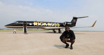 Rick Ross in front of his newly painted G550, which features the rapper's name in big gold letters