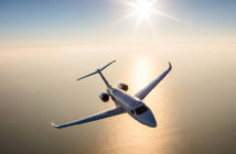 The Cessna Citation Longitude flying over water