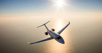 The Cessna Citation Longitude flying over water