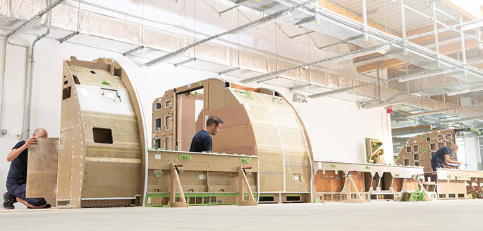 Specialists work on the interior off the aircraft