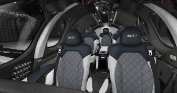 Interior with Heather Grey textile, Graphite quilted and perforated leather, Superior Blue leather with 500th branding, and Vision Blue accents