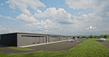 Rendering of airport building with aircraft taking off