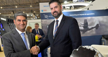 Paras Dhamecha and David Falberg shaking hands