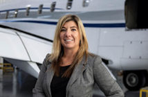 Meghan Knott in front of aircraft